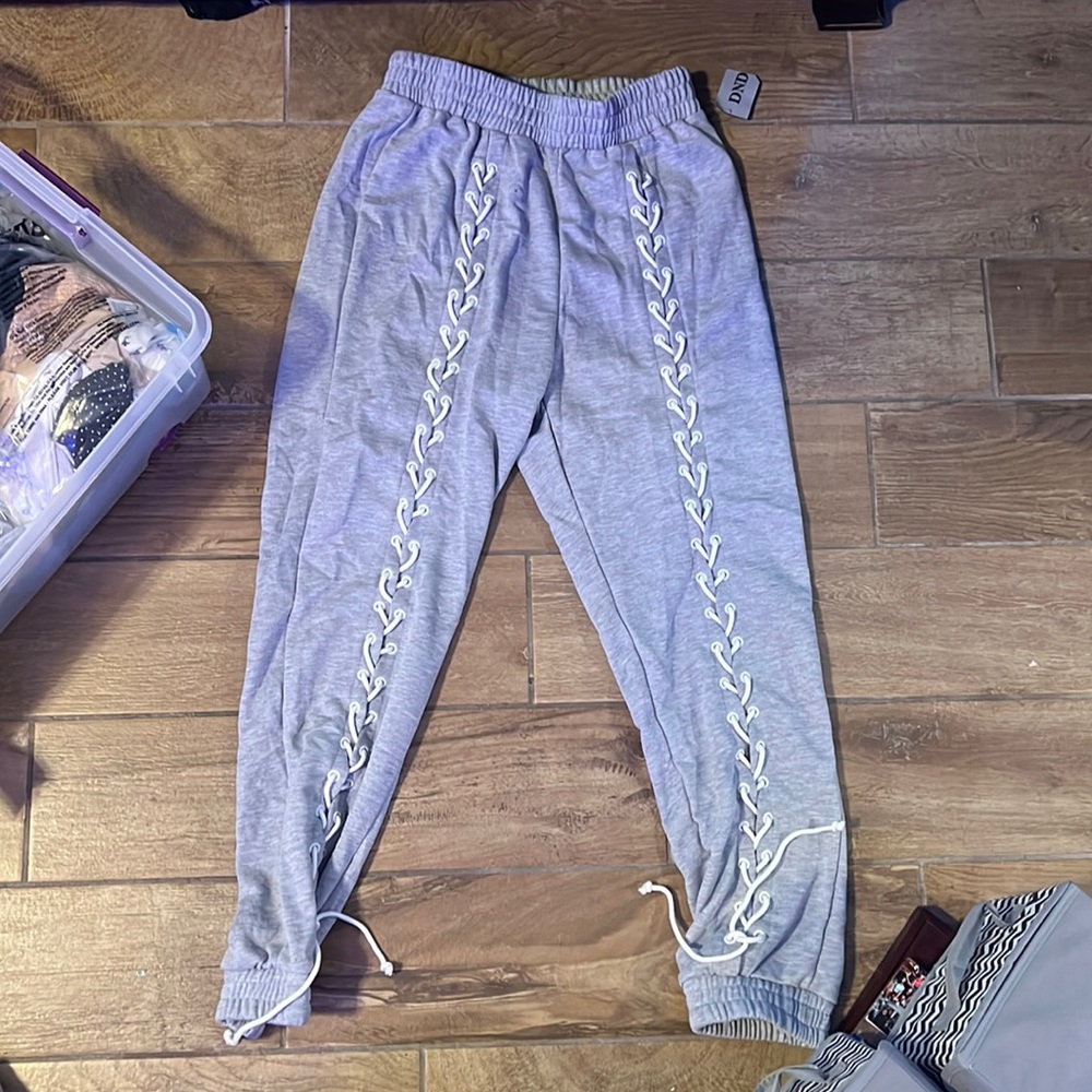 grey sweats with ties going down